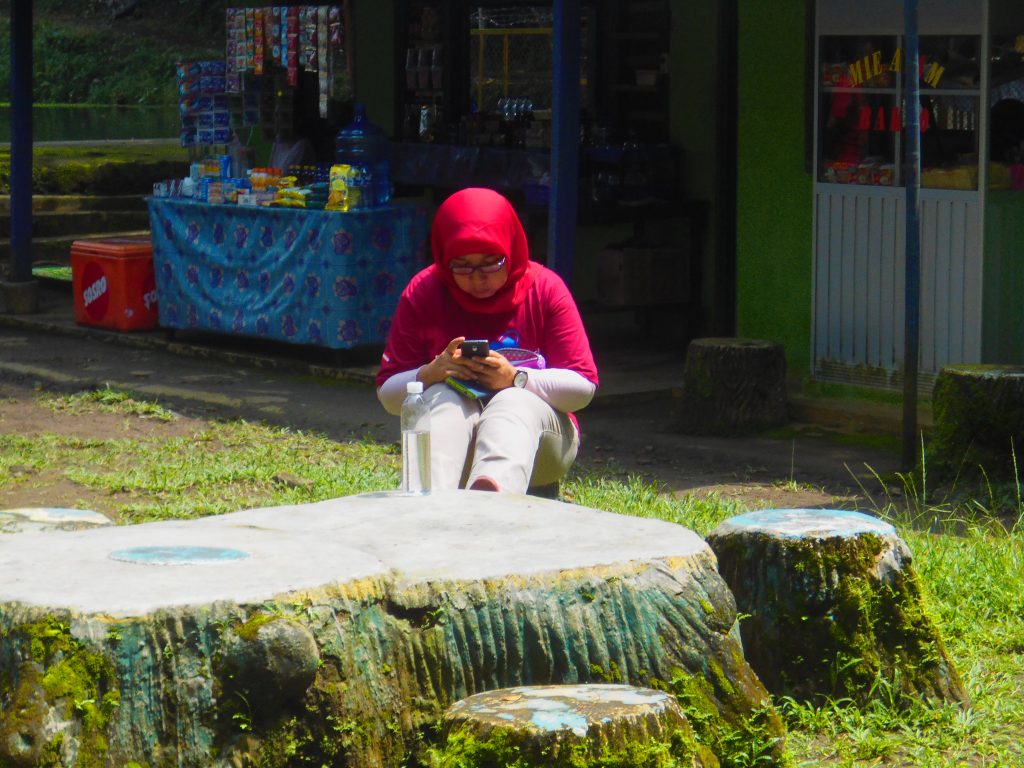 Mbak Deasy with Her Phone